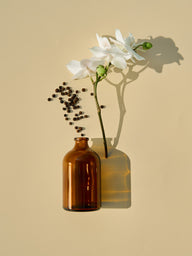 Huile parfumée au poivre noir et à l'orchidée veloutée